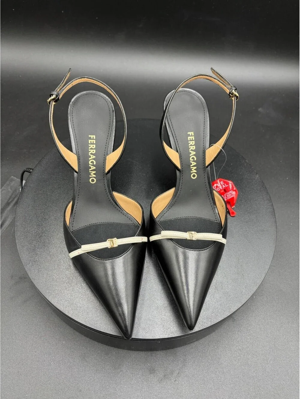 Ferragamo Black Leather Pointed Toe Slingback Heels with Off